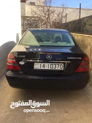  8 مرسيدس e200 كرت ابيض موديل 2004 للبيع