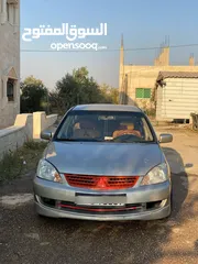  9 لانسر قير عادي متور 1300 فحص 2 جيد