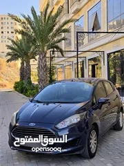  2 فورد فييستا 2014 سيارة لقطة مميزة من كل النواحي لون باطوني أصل شركة مميزة