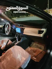  14 تويوتا كورولا موديل2015 فحص كامل لون فيراني مميزه   وغرفه بيج  مميزه جدا  فحص كامل 7 جيد ملاحظه السي
