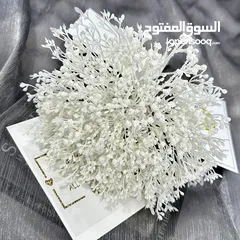  21 كل مايلزم مسكات العرائس وباقات الورد الصناعي