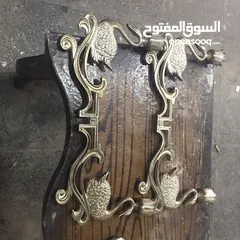  7 تمثال برونزي مع شمعدان فضة