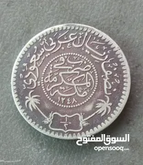  2 عملة معدنية سعودية قديمة