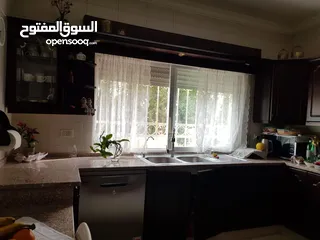  1 في موقع مميز في الدوار السابع شقة أرضيه 125م مع حديقة بتشطيبات راقيه / ref 9529