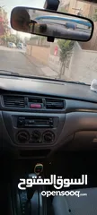  11 ميتسوبيشي لانسر 2004 1300 سي سي  بحالة جيدة