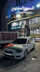  21 لانسر فراشه ex 2014  خصوصي اصلي بحال الشركه مالك ثاني