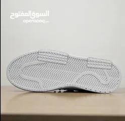  8 Black and white designer shoes  size: 42 negotiable price  FREE DELIVERY