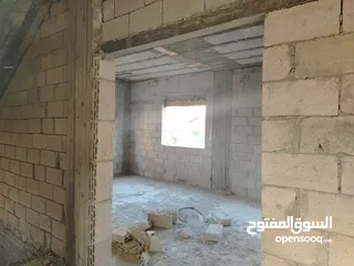  11 بيت عظم المغاريب واجهة حجر