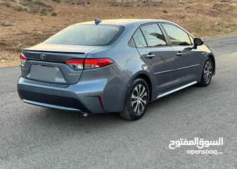  3 تويوتا كرولا هايبرد 2020 بحاله ممتازه ب 12800