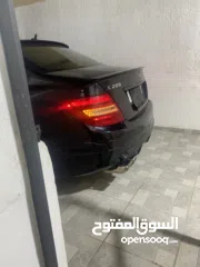 3 مرسيدس c200 2009 ترخيص 12 فل اضافات عدا فتحة  موتور 1800ccبنزين  تعديل خارجي كامل AMG