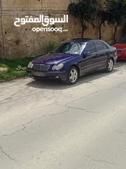  1 مرسيدس c200/ افنجارد فل كامل وفحص كامل موديل 2001 ماتور 2000 احمر
