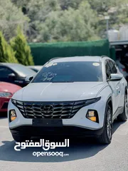  1 هونداي توسان 2022  فل اضافات بدون فتحة سقف  فحص نخب  عداد 22 الف كيلو  الجب كرتونة