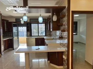  1 شق فارغه للايجار في البيره شا رع القدس قرب عرابي