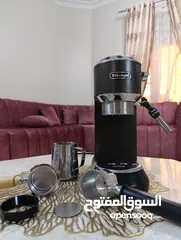  1 مكينة صنع قهوة ( ديلونجي ديديكا ) + بعض ملحقات