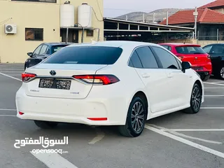  5 تيوتا كورولا هايبرد ترخيص 2022 فل بدون فتحة مميزة  ماتور 1800cc ( بنزين + كهرباء) 170Hp