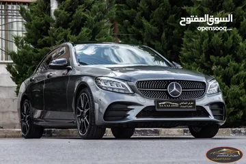 15 Mercedes C200 2019 Mild hybrid Amg kit Night Package   السيارة وارد الشركة و قطعت مسافة 83,000 كم