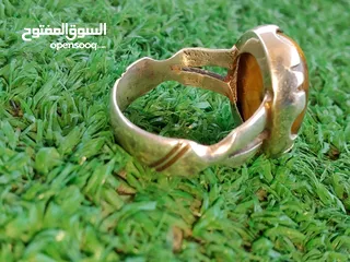 4 خاتم فضة قديم جدا متوج بحجر عين النمر الطبيعي