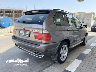  8 BMW_X5_4.8is