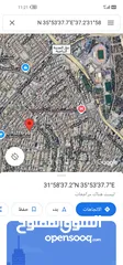 1 ارض للبيع بالشميساني موقع مميز على شارعين خلف مستشفى التخصصي