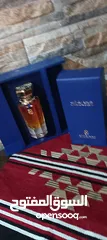  11 عطر خلطه القرشي جديد90مل للرجال والنساء  مع ستاند خشب لون ازرق