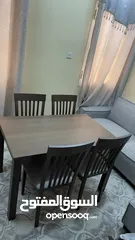  1 طاولة طعام خشبيه