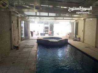  2 شقة أرضية مميزة للبيع في أم أذينة 200م مع حديقة وترسات وبركة سباحة 150م بسعر مغري