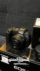  2 Canon R8 mirrorless camera with rf50mm 1.8 and ef adapter