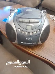  1 دي في دي وكاسات وراديو سانيو