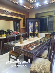  4 طاولة سفرة مع 8 كراسي تم تفصيله ومعها لوح زجاجي عازل للحراره