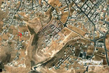  1 للبيع قطعة ارض غرب عمان منطقة سكنية واجهة على الشارع العام