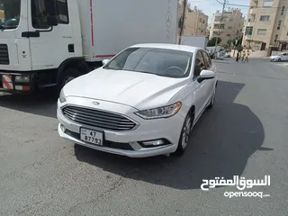  12 فورد فيوجن 2017هايبرد فحص كامل لون ابيض