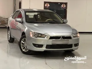  1 ميتسوبيشي لانسر 2016 كرت ابيض