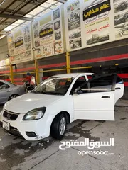  2 Kia Rio 2011