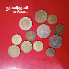  2 عملة معدنية وورقية مغربية وعملة اجنبية نديرة