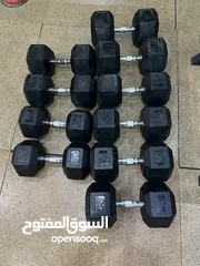  5 Rubber coated dumbbells and treadmill for sale