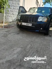  5 جيب شيروكي 2005 محول  srt 2010 لون اسود 4&4 فل ما عدا الفتحه فحص جيد قصعات ترخيص وتأمين لتاريخ 8\15
