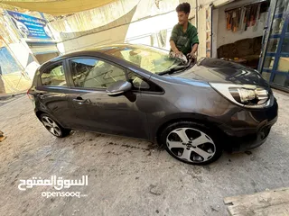  5 كيا ريو هاتشباك 2013