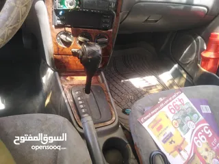  9 كيا سبكترا 2001 Mr لون اسود ملوكي بسعر مغري