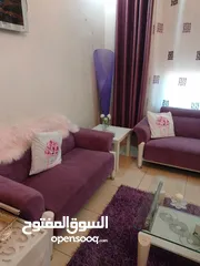  5 طقم كنب +طاولة سفرة خشب ثمانية مقاعد