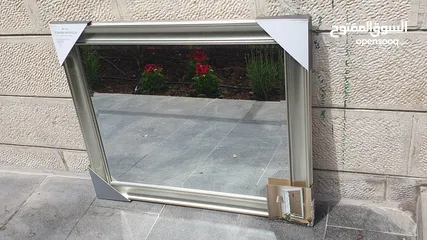  1 new silver frame mirror