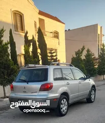  12 متسوبيشي اوتلاندر 2003 بحالة الشرگه