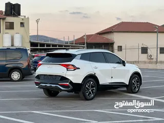  6 كايا سبورتاج /2022 فل بدون فتحة سقف  2x4 ///240Hp بنزين + كهرباء  ( Haybrid) 1600cc