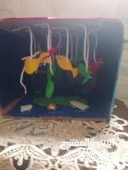  1 حوض سمك من الكرتون وورق