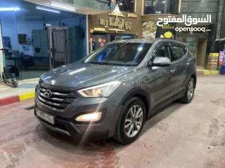  5 هونداي سنتافيه 2015 مطور 2000 ديزل اتوماتيك فل الفل بدون فتحه بسعررررر 66000 الف بسعرررر حرررق