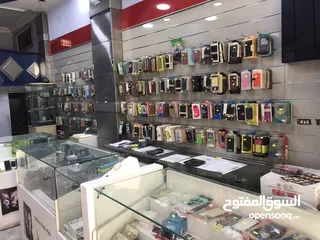  13 محل تجاري للبيع مجهز كامل موقع مميز ملاصق لمعرض شركة زين - شارع باب الواد - الوسط التجاري/ الزرقاء