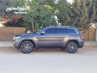  7 جيب جراند شيروكي فل الفل اعلى فئة بانوراما 2014 فحص كامل لون فيراني مميز بسعر مغري قابل للبدل والاقص
