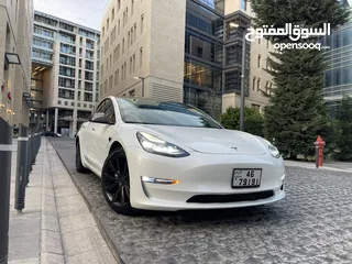  1 تسلا لون ابيض جمرك اليوم 2023