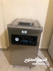  1 ماكينة فاكيوم ( سحب هواء وتغليف )