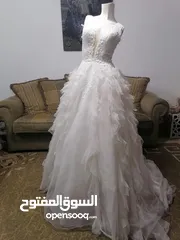  28 بدلات زفاف وخطبة وملون... فساتين زفاف وخطبة وملون وطرحات عروس وتوربان عروس