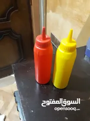  3 زجاجات كاتشب ومستردة